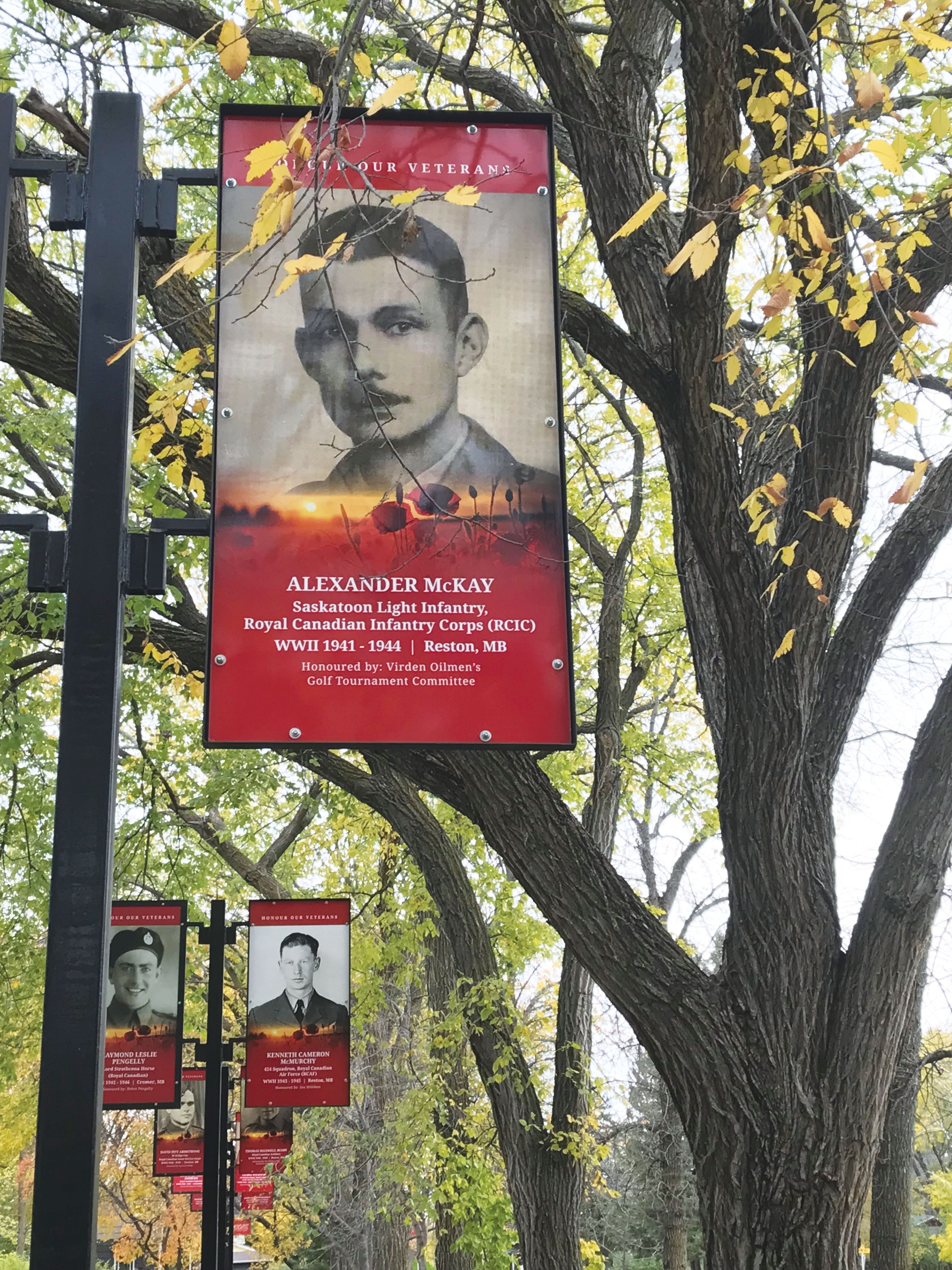 Alexander McKays  veteran banner at Reston Memorial Park, right.